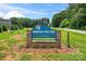Mountain Creek Park sign with stone base, landscaped, and visible road at 3078 Mountain Creek Dr, Sherrills Ford, NC 28673