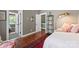 Bedroom with a view of the ensuite and access to the hallway at 314 Center Dr, Davidson, NC 28036