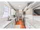 Spacious kitchen featuring stainless steel appliances and bright white countertops at 314 Center Dr, Davidson, NC 28036