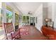 Cozy sunroom with floor to ceiling windows and wood trim at 314 Center Dr, Davidson, NC 28036