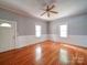 Living room with hardwood floors, fresh paint, and natural light at 318 Chestnut Ave, Kannapolis, NC 28081