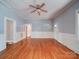Spacious living room with hardwood floors, fresh paint, and great layout at 318 Chestnut Ave, Kannapolis, NC 28081