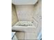 Relax in this bathroom's luxurious jetted tub with stylish tile surround and modern fixtures at 35 Caldwell Dr, Taylorsville, NC 28681