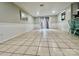 Open living room with tile flooring and sliding glass doors at 35 Caldwell Dr, Taylorsville, NC 28681
