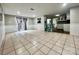 Open living space with tile floors, access to backyard, and dining area at 35 Caldwell Dr, Taylorsville, NC 28681
