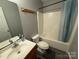 Clean bathroom with modern fixtures, a single sink vanity, and a shower-tub combination at 405 Jose St, Shelby, NC 28150