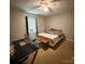 Comfortable bedroom with a queen-sized bed, desk, and neutral decor offering a relaxing retreat at 405 Jose St, Shelby, NC 28150