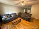 Spacious living room featuring hardwood floors and comfortable seating with a ceiling fan at 405 Jose St, Shelby, NC 28150