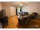 Cozy living room boasts a soft couch, natural light, and a serene atmosphere at 405 Jose St, Shelby, NC 28150