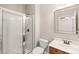 Bright bathroom with glass enclosed shower and wood vanity with modern finishes and lighting at 4352 Haddington Dr, Fort Mill, SC 29707