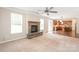 Spacious living room features a fireplace and is open to the kitchen, perfect for entertaining at 4352 Haddington Dr, Fort Mill, SC 29707