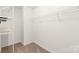 Walk-in closet with carpet and shelving at 4352 Haddington Dr, Fort Mill, SC 29707