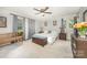 Comfortable bedroom with neutral walls, carpet, and multiple windows at 4630 Woodleaf Rd, Salisbury, NC 28147