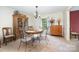 Elegant dining room featuring a classic hutch and natural light at 4630 Woodleaf Rd, Salisbury, NC 28147