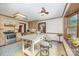 Unique kitchen featuring a large island, modern appliances, and decorative lighting at 4630 Woodleaf Rd, Salisbury, NC 28147