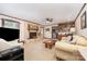 Relaxing living room featuring a fireplace, built-in shelves, and comfortable seating at 4630 Woodleaf Rd, Salisbury, NC 28147