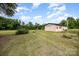Large outbuilding in a grassy field, offering ample space for storage and various outdoor activities at 4630 Woodleaf Rd, Salisbury, NC 28147