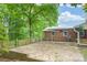 Outdoor deck with brick foundation, covered patio area perfect for relaxing and entertaining at 466 Shiloh Church Rd, Hickory, NC 28601