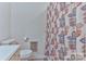 Cozy bathroom showcasing a toilet and patterned shower curtain at 466 Shiloh Church Rd, Hickory, NC 28601