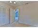 Comfortable bedroom featuring neutral carpet, a ceiling fan, and a closet at 466 Shiloh Church Rd, Hickory, NC 28601