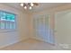 Comfortable bedroom featuring neutral carpet, a ceiling fan, and a closet at 466 Shiloh Church Rd, Hickory, NC 28601