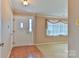 Inviting foyer with hardwood floors and natural light streaming through the window at 466 Shiloh Church Rd, Hickory, NC 28601