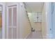 Hallway with closet and stairs, showcasing the architecture and layout of the home at 466 Shiloh Church Rd, Hickory, NC 28601