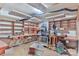 Workshop with ample shelving, workbenches, and organized tool storage, perfect for DIY projects and hobbies at 466 Shiloh Church Rd, Hickory, NC 28601