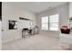 Bright room with neutral walls, carpet flooring, desk, and a large window at 4689 Kingswood Dr, Indian Land, SC 29707
