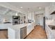 Bright kitchen features stainless appliances, white cabinetry, and an island with a sink at 4689 Kingswood Dr, Indian Land, SC 29707