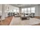 Open living space with natural light and views into the modern kitchen at 4689 Kingswood Dr, Indian Land, SC 29707
