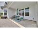 Outdoor patio perfect for entertaining with stylish furniture, and an umbrella at 4689 Kingswood Dr, Indian Land, SC 29707