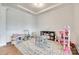 A playroom with an area rug, a small table and chairs, and a play kitchen set at 4689 Kingswood Dr, Indian Land, SC 29707