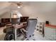 Bonus room complete with desk, comfortable chair, built in shelving, and media center at 4715 Lenden Hall Ct, Gastonia, NC 28056