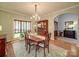 Beautiful dining room with hardwood floors, chandelier, and an arched entrance at 4715 Lenden Hall Ct, Gastonia, NC 28056