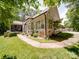 Attractive home with manicured landscaping and a walkway to the front door at 4715 Lenden Hall Ct, Gastonia, NC 28056