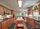 Spacious kitchen with custom cabinets, an island, and stainless steel appliances at 4715 Lenden Hall Ct, Gastonia, NC 28056