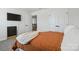Bedroom featuring neutral color scheme with carpet flooring and great natural light at 5121 Ennisworth Ln, Charlotte, NC 28214