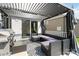 Shaded patio area with outdoor seating under a pergola featuring outdoor seating, and an outdoor kitchen at 5121 Ennisworth Ln, Charlotte, NC 28214