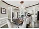 Formal dining room featuring wood trim, stylish furnishings, and chandelier lighting at 524 Wildbrook Walk, Fort Mill, SC 29708