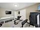 Well-equipped home gym with workout machines and fitness accessories at 524 Wildbrook Walk, Fort Mill, SC 29708
