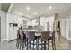 Spacious kitchen with stainless steel appliances, granite countertops, and a breakfast bar at 524 Wildbrook Walk, Fort Mill, SC 29708