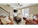 Comfortable living room with cozy seating and a stylish ceiling fan at 524 Wildbrook Walk, Fort Mill, SC 29708