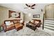 Spacious living room featuring plush leather sofas and artistic decor at 524 Wildbrook Walk, Fort Mill, SC 29708