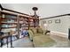 Cozy living room featuring built-in bookshelves and an antler chandelier at 524 Wildbrook Walk, Fort Mill, SC 29708