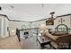 Upstairs loft with a view of the fireplace and arched windows at 524 Wildbrook Walk, Fort Mill, SC 29708