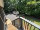 View of a large, shady backyard with a shed and gravel area at 533 Tuckers Grove Rd, Statesville, NC 28625