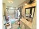 Updated bathroom featuring a large, walk-in tiled shower and modern vanity at 533 Tuckers Grove Rd, Statesville, NC 28625