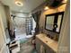 Stylish bathroom featuring a tiled shower, modern fixtures, and a clean design for a refreshing and functional space at 533 Tuckers Grove Rd, Statesville, NC 28625