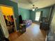 Cozy bedroom with a ceiling fan and a view of the yard at 533 Tuckers Grove Rd, Statesville, NC 28625